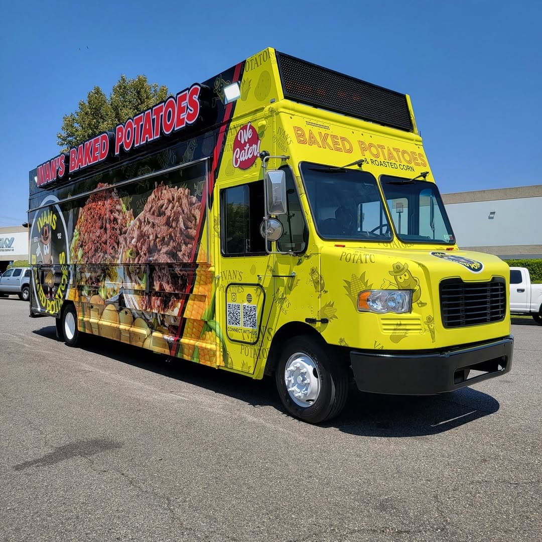 Wam's Baked Potatoes yellow food truck wrap with photo-realistic menu