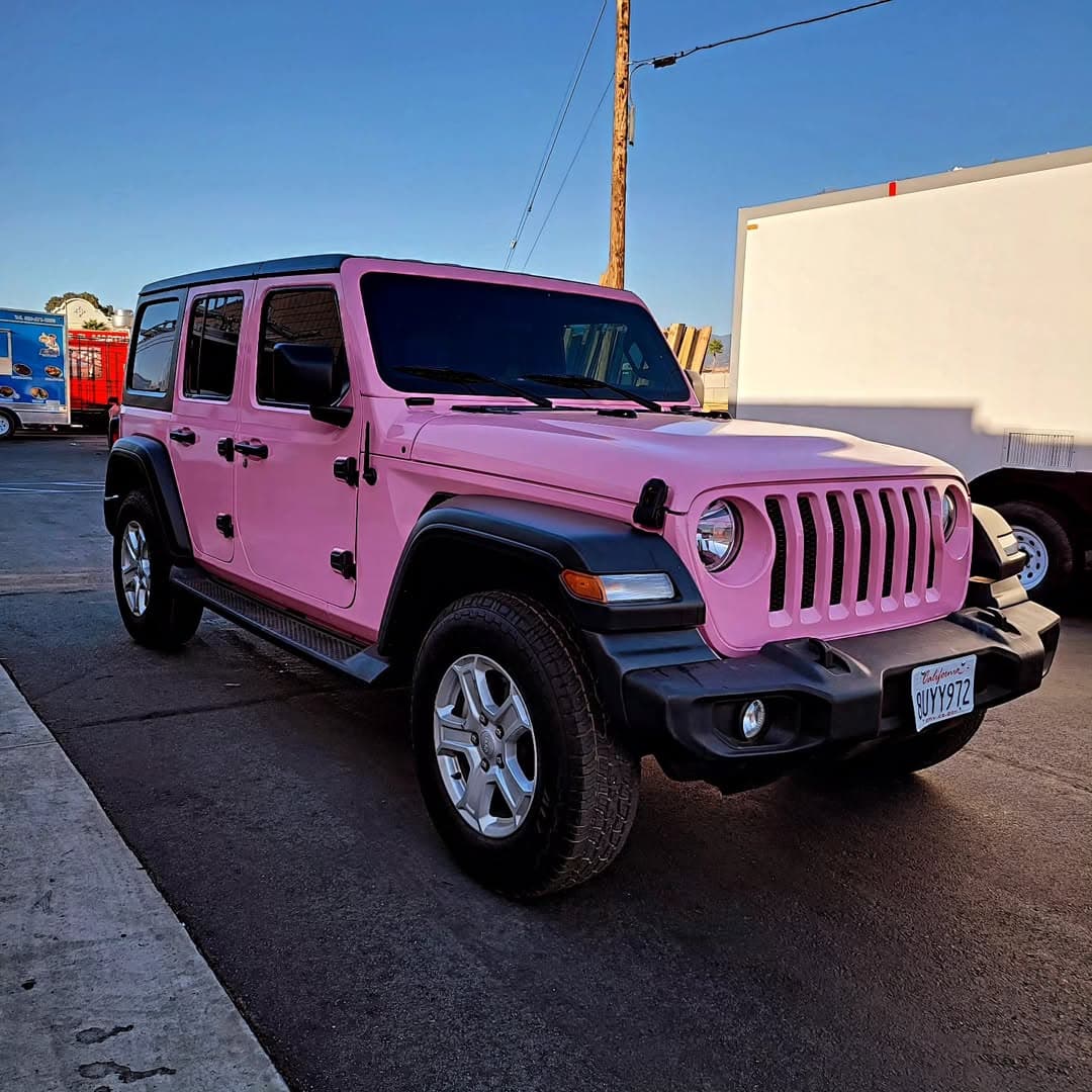 Pink Jeep Wrangler Unlimited full color change wrap