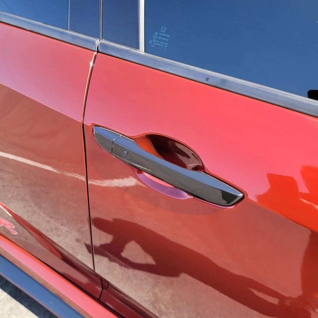 Closeup detail of red Honda Civic Type R wrap finish